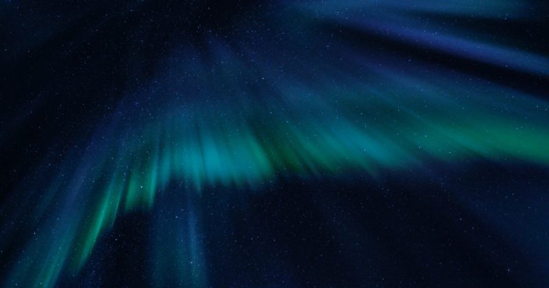 An awe-inspiring aurora borealis illuminating the night sky.