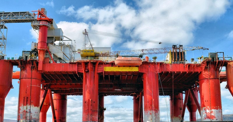 An oil rig on the ocean.