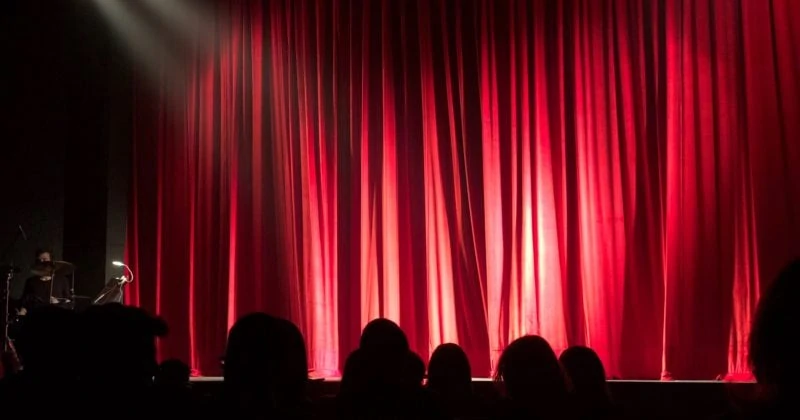 Elmhurst Centre for Performing Arts showcases a captivating red curtain performance.