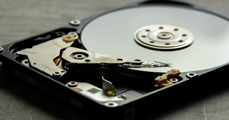 A close up of a hard drive on a table showcasing the 6 best WordPress backup plugins.