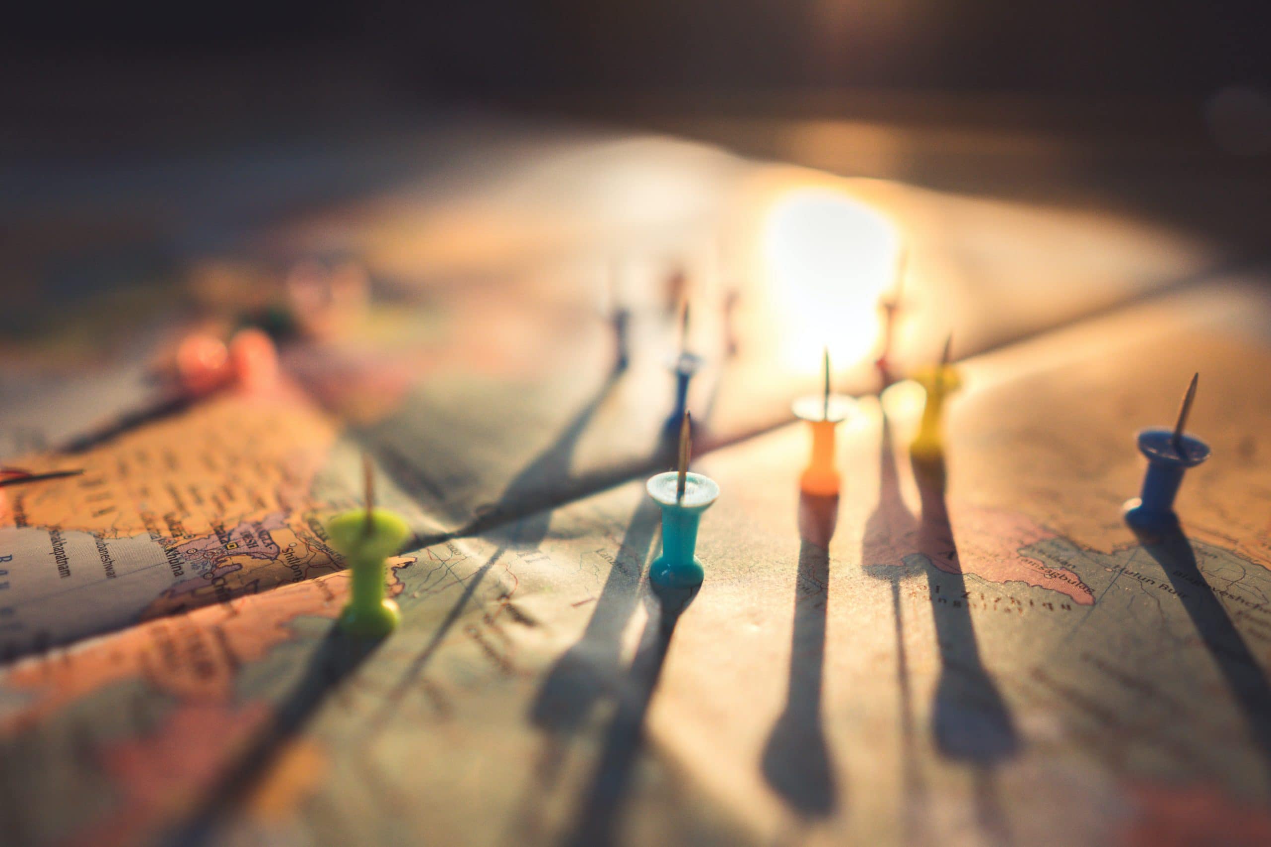 Local SEO services for mapping pins on a world map.