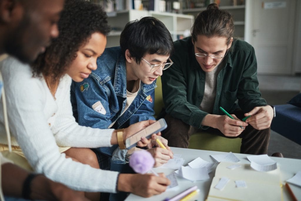 A collective education project involving collaborative work on a paper.