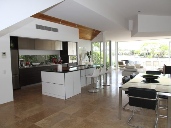 A Real Estate kitchen featuring a dining table and chairs.