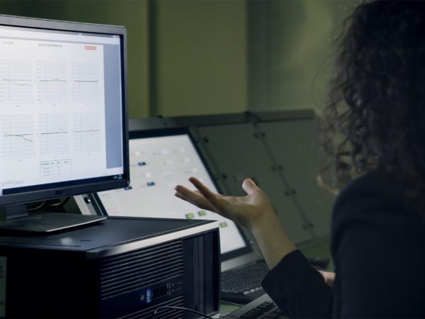 A recruiter is looking at a computer screen.