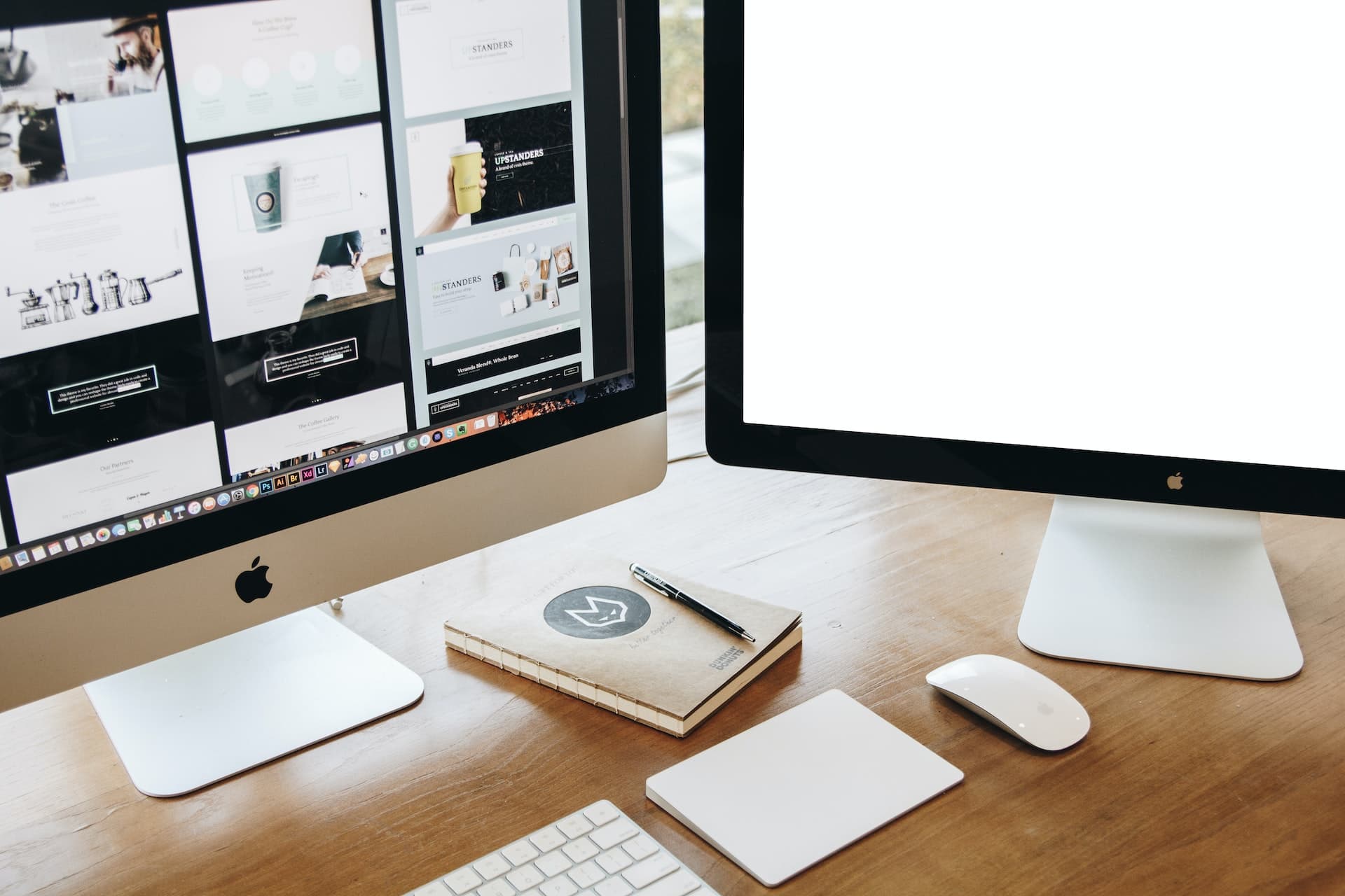 Recruiters and staffing professionals utilize dual monitors and a keyboard at their workstation.