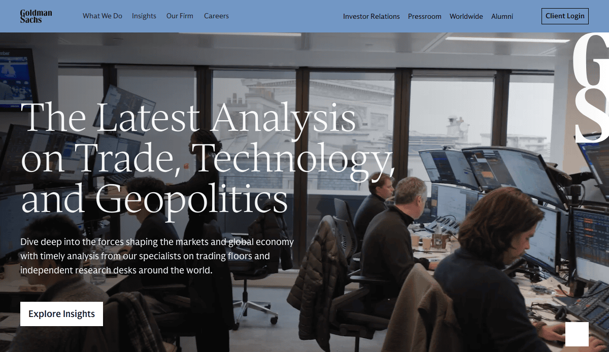 A modern trading floor with people working at computer monitors; overlaid text reads, The Latest Analysis on Trade, Technology and Geopolitics. Explore Insights with Goldman Sachs branding for financial services that help build trust.