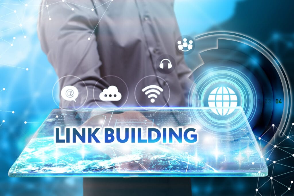 A man demonstrating how backlinks can improve your SEO by holding a tablet with the word "link building" on it.