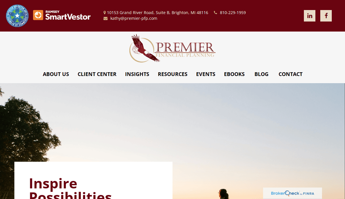 Screenshot of the Premier Financial Planning website homepage, highlighting expert website design that builds trust, featuring the company logo, navigation menu, contact info, and a banner image with a tree and sky at sunset.