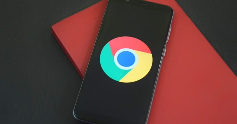 The Google Chrome logo is displayed on a smartphone.