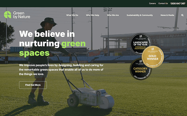 A person mowing grass on a field under a clear sky captures our dedication to nurturing green spaces. Text reads "We believe in the best landscaping." Several awards are displayed on the right side, testament to our expertise in landscaping excellence.