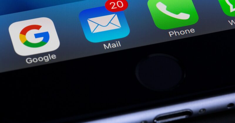 An iPhone displaying icons, complying with CAN SPAM Act – U.S. Anti Spam Laws.