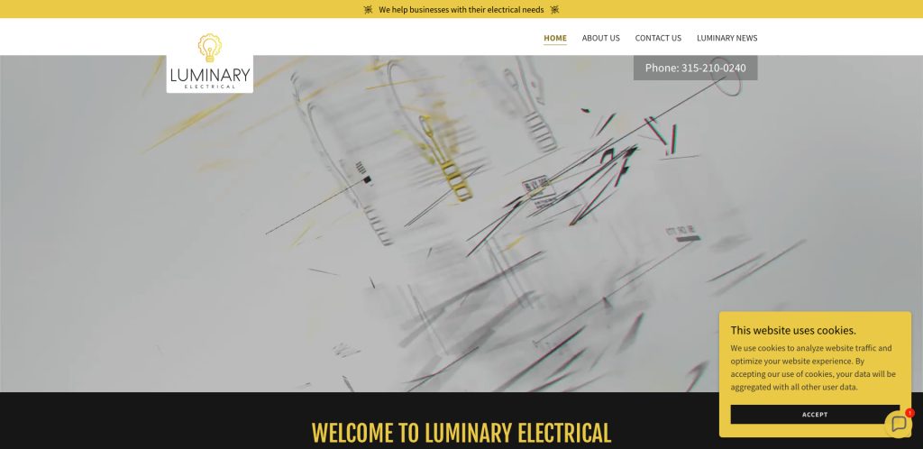 Screenshot of the Luminary Electrical website homepage—an example of great electrician website design—featuring a lightbulb logo, navigation menu, phone number, cookie consent pop-up, and text saying, Welcome to Luminary Electrical.