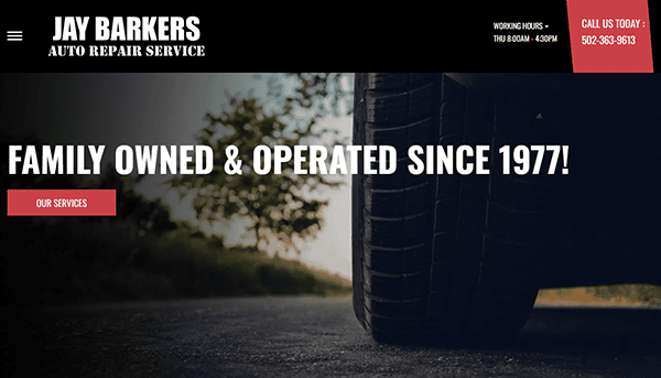 Close-up of a car tire on pavement with text overlay: "JAY BARKERS AUTO REPAIR SERVICE, Family Owned & Operated Since 1977!"—your choice for the best auto repair. Contact info displayed in side banners.