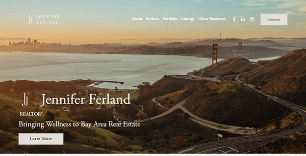 A scenic view of the Golden Gate Bridge and surrounding hills at sunset graces the best real estate website's homepage.