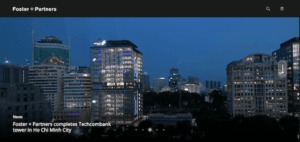 A picture of a city at night with buildings in the background.