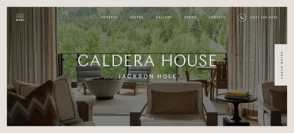 Luxury hotel website homepage featuring the name "caldera house jackson hole" with a scenic view from a window.