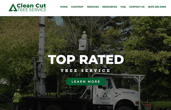 Tree service professional in a cherry picker trimming a tree near a residential area.