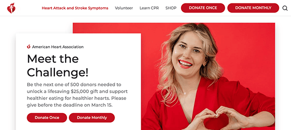 Woman forming a heart shape with her hands for an american heart association fundraising campaign.