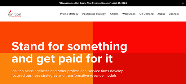 A screenshot of the ignition consulting group's website, highlighting a slogan "stand for something and get paid for it" against a red and orange background.