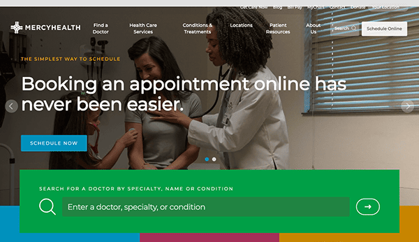 Website homepage for mercy health with a booking panel, featuring a healthcare professional using a tablet while interacting with a patient.