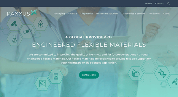 Healthcare professional in scrubs with a blurred background on a website homepage for paxxus, a company offering engineered flexible materials for healthcare and life sciences.