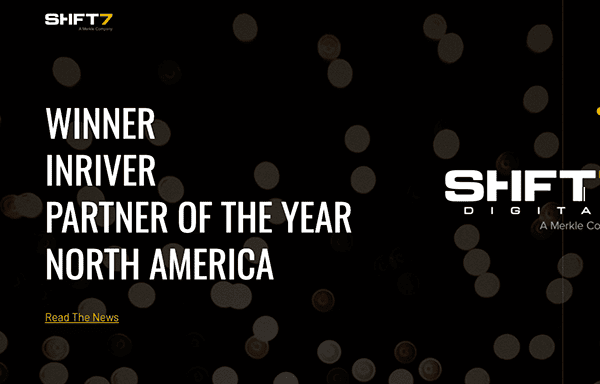 Award announcement graphic for "partner of the year north america" with bokeh background.