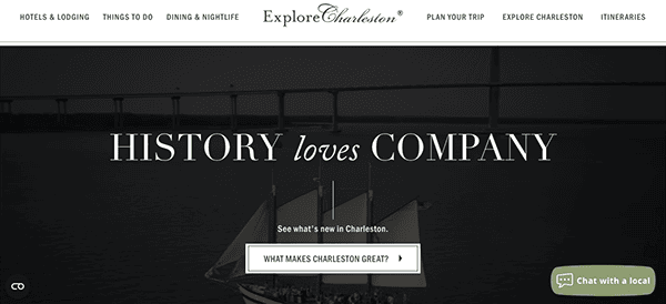 Website banner featuring the text "history loves company" over an image of a sailboat passing under a large bridge, with a twilight sky in the background.