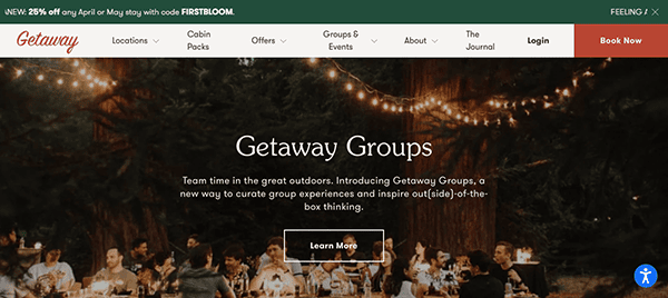 Website banner image for "getaway groups" featuring a group of people dining outdoors at a long table, surrounded by trees and string lights, with a "learn more" button.