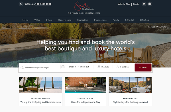 Screenshot of the homepage of a luxury hotel booking website, featuring a header image of a scenic hotel pool overlooking a serene landscape.