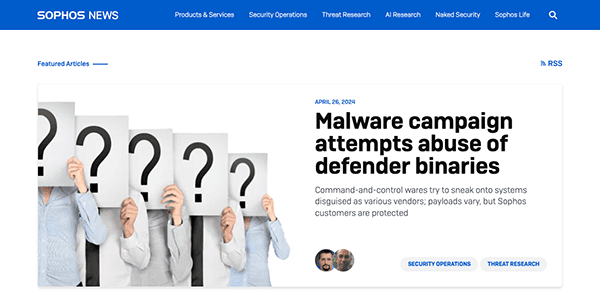 Website homepage of sophos news displaying a featured article about a malware campaign with a graphic of three people holding question mark signs.