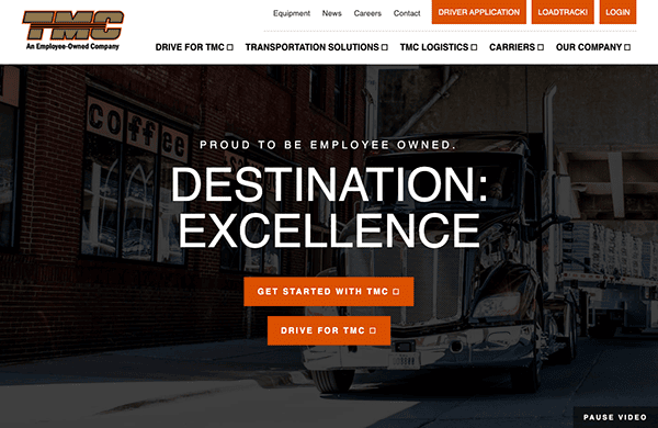 Website homepage of tmc transportation featuring a header image with a parked truck and the slogan "destination: excellence" along with navigation links and buttons.