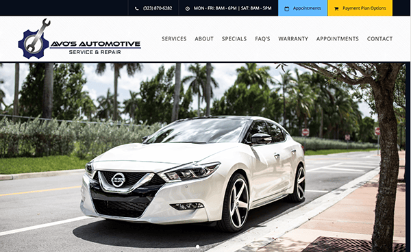 White Nissan sedan parked on the street, featured on Avo's Automotive Service & Repair website. The page offers links to services, about, specials, FAQs, warranty, appointments, contact, and more.