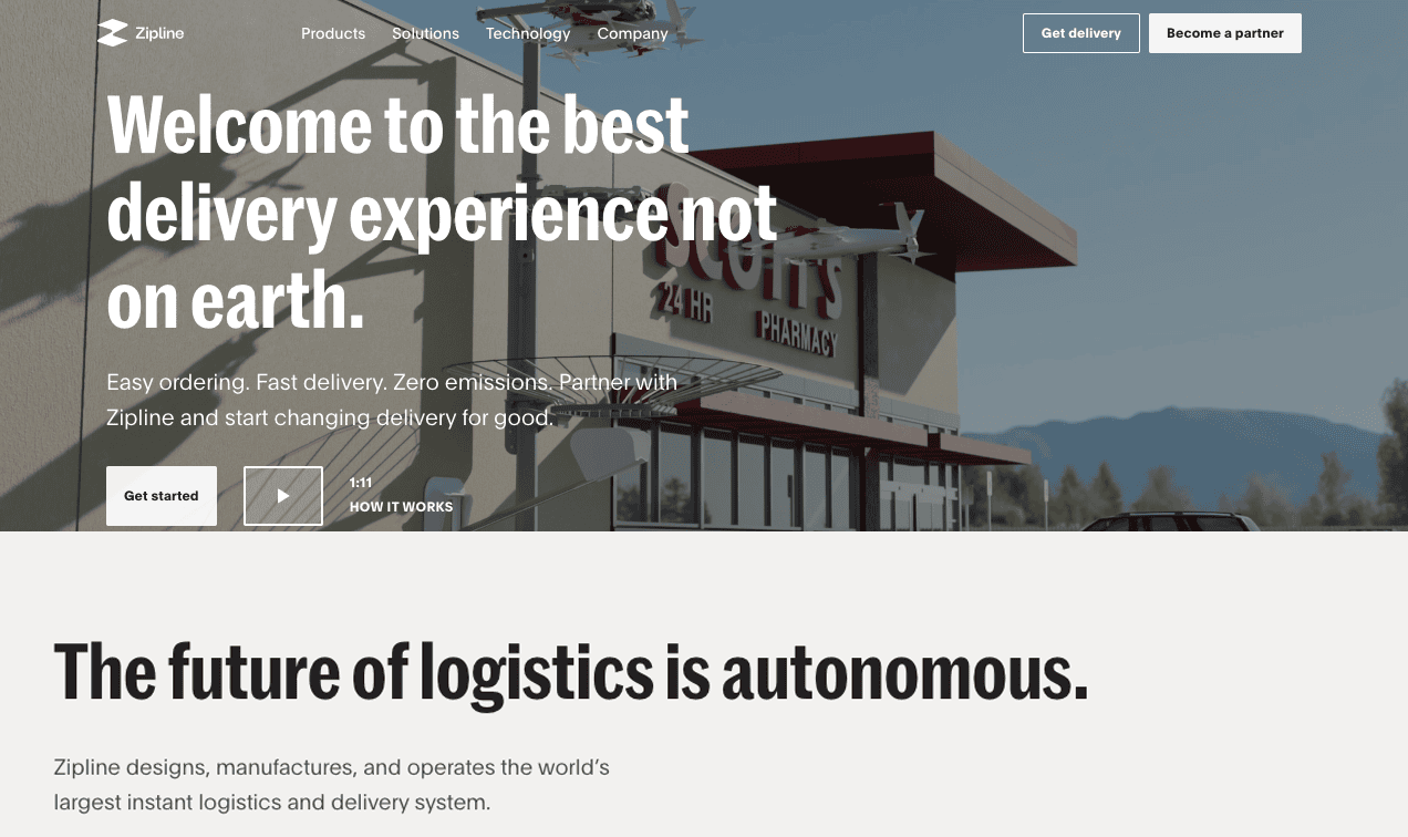 Website homepage for Zipline featuring a banner image of a modern building with the logo and text discussing its drone delivery and autonomous logistics solutions.