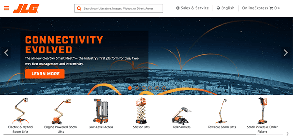 Website homepage of jlg industries showcasing a range of aerial work platforms and lift equipment, with a night cityscape background and banner about smart fleet technology.