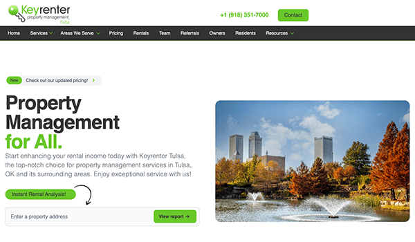 Website homepage of Keyrenter Property Management featuring a banner with an image of a serene park and skyscrapers in the background, contact information, and navigation menu.