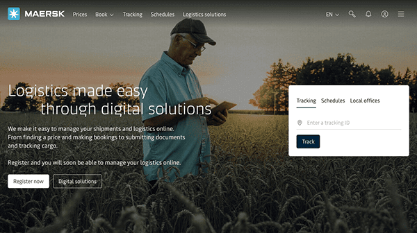Senior man using a tablet in a wheat field with a website overlay offering logistics solutions, featuring tracking and scheduling options.