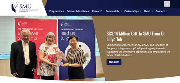 Three individuals at a ceremonial event, one presenting a check to another, with banners of singapore management university in the background.