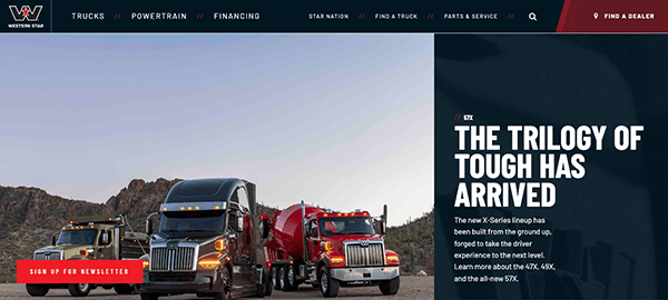 Three trucks driving on a desert road with mountains in the background, promoting the "trilogy of tough" for western star trucks.