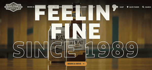 Two beer bottles on a wooden table with large text overlay reading "Feelin' Fine Since 1989," and the Boulevard Brewing Co. logo in the corner—an image worthy of featuring on the best brewery websites for top-notch brewery SEO.