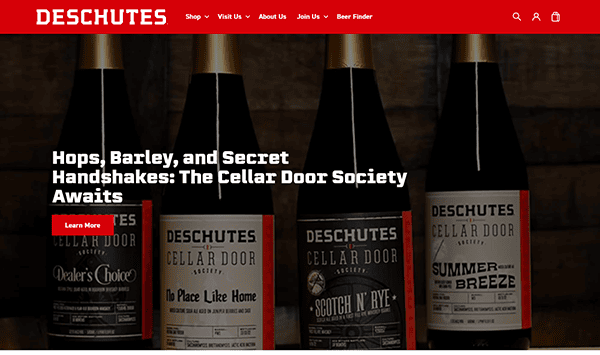 Bottles of Deschutes Cellar Door Society beers are beautifully displayed, showcasing "No Place Like Home," "Scotch N' Rye," and "Summer Breeze." Discover the best brewery's exclusive offerings through engaging brewery websites.