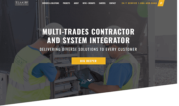 Two workers in safety vests operate control panels. Text: "Multi-Trades Contractor and System Integrator - Delivering Diverse Solutions to Every Customer." Discover excellence with the best Commercial Electrician Websites. Yellow button: "Dig Deeper.