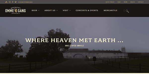 Entrance to a brewery with trees and buildings in the background; "Where Heaven Met Earth... And Stayed Awhile" text on the image, capturing the essence you'd find on the best brewery websites.