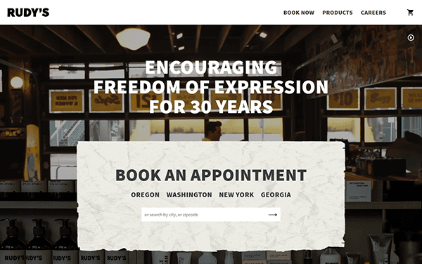 A website homepage showcasing a commitment to "Encouraging Freedom of Expression for 30 Years" offers visitors the chance to schedule an appointment at distinguished barber shops in Oregon, Washington, New York, or Georgia.
