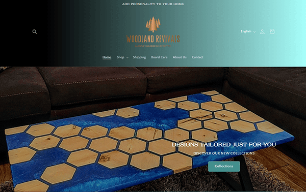 The homepage for Woodland Revivals showcases a stunning wooden and blue resin table design. Featuring navigation links and a banner stating "Designs Tailored Just For You," it is a prime example of the best carpenter sites, complete with a "Collections" button for easy browsing.
