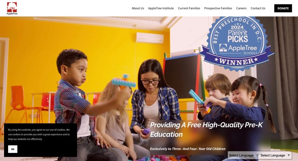 A teacher helps four young children play and learn with colorful toys in a classroom. A Best Preschool 2024 Winner badge is displayed, highlighting daycare services and free, high-quality pre-K education for three- and four-year-olds.