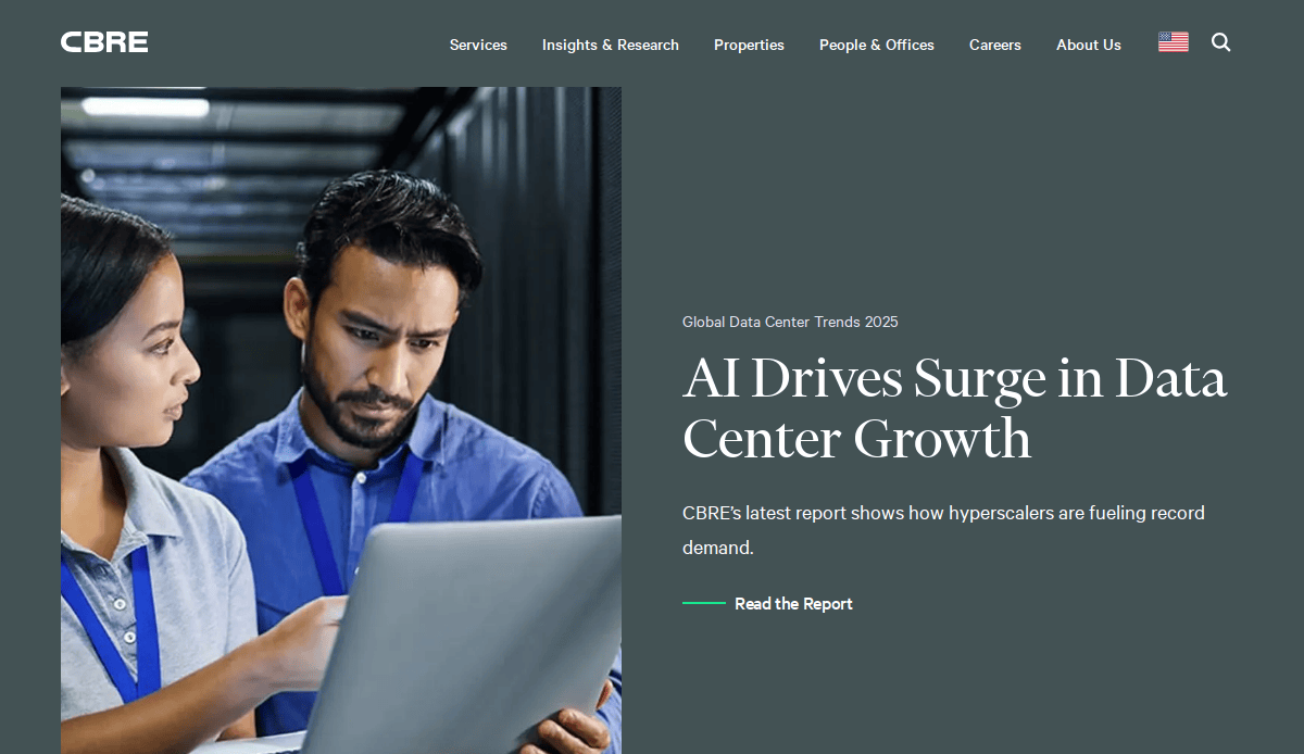 Two professionals, one holding a tablet, review data in a server room. Text on the image reads, AI Drives Surge in Data Center Growth, highlighting a CBRE report on rising demand in commercial real estate.