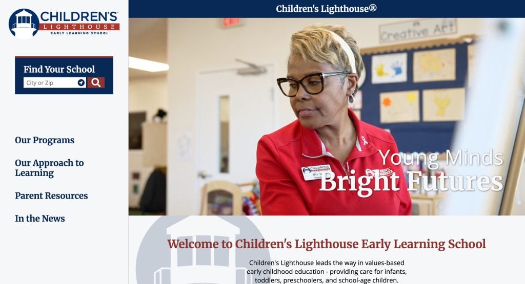 A woman wearing glasses and a red shirt interacts with a child in a classroom. The text “Young Minds Bright Futures” and “Welcome to Children’s Lighthouse Early Learning School” highlights one of the best daycare websites for families.