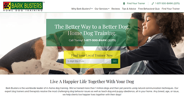 Screenshot of the Bark Busters Home Dog Training website homepage, showcasing its reputation as one of the best dog training sites. Highlights include a green banner with a phone number, a zip code search feature, and an endearing image of a dog and child.