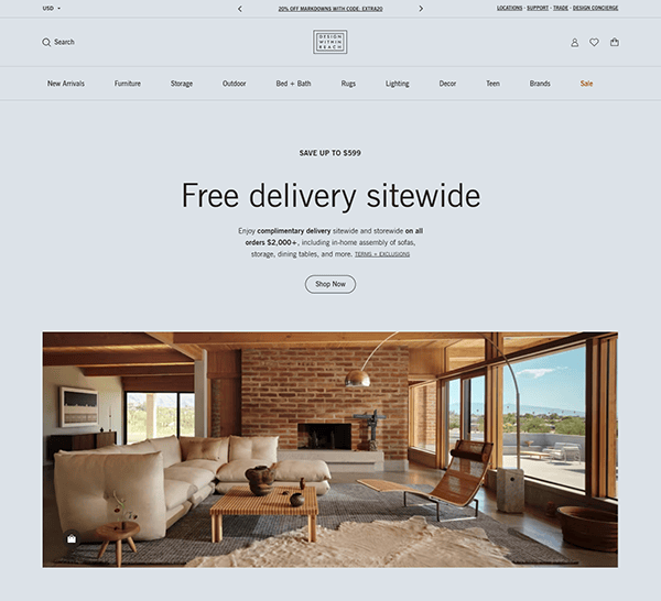 The website homepage boasts a promotional banner: "Free delivery sitewide." Below, an image showcases the best in modern living rooms, featuring large windows and stylish furniture.