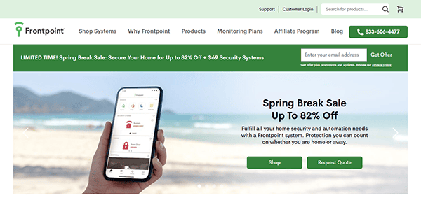 A hand holds a smartphone displaying the Frontpoint app, showcasing home security options. The image promotes a "Spring Break Sale Up to 82% Off" with buttons for "Shop" and "Request Quote", highlighting why it ranks among the best security websites for home protection.